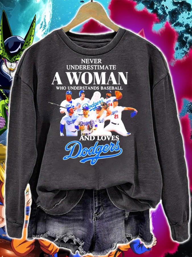 Never underestimate a woman who understands basketball and loves Doggers shirt sweatshirt